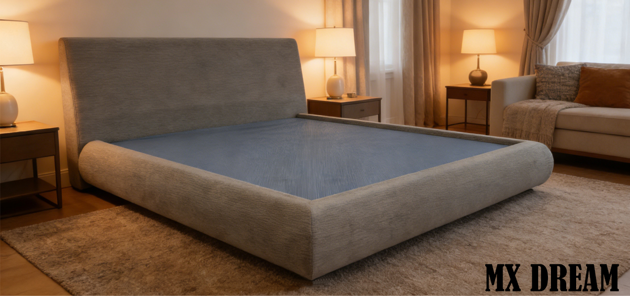 Luxury hotel room setting featuring the Cloud-Series upholstered bed frame with rounded soft edges and a plush headboard under warm ambient lighting
