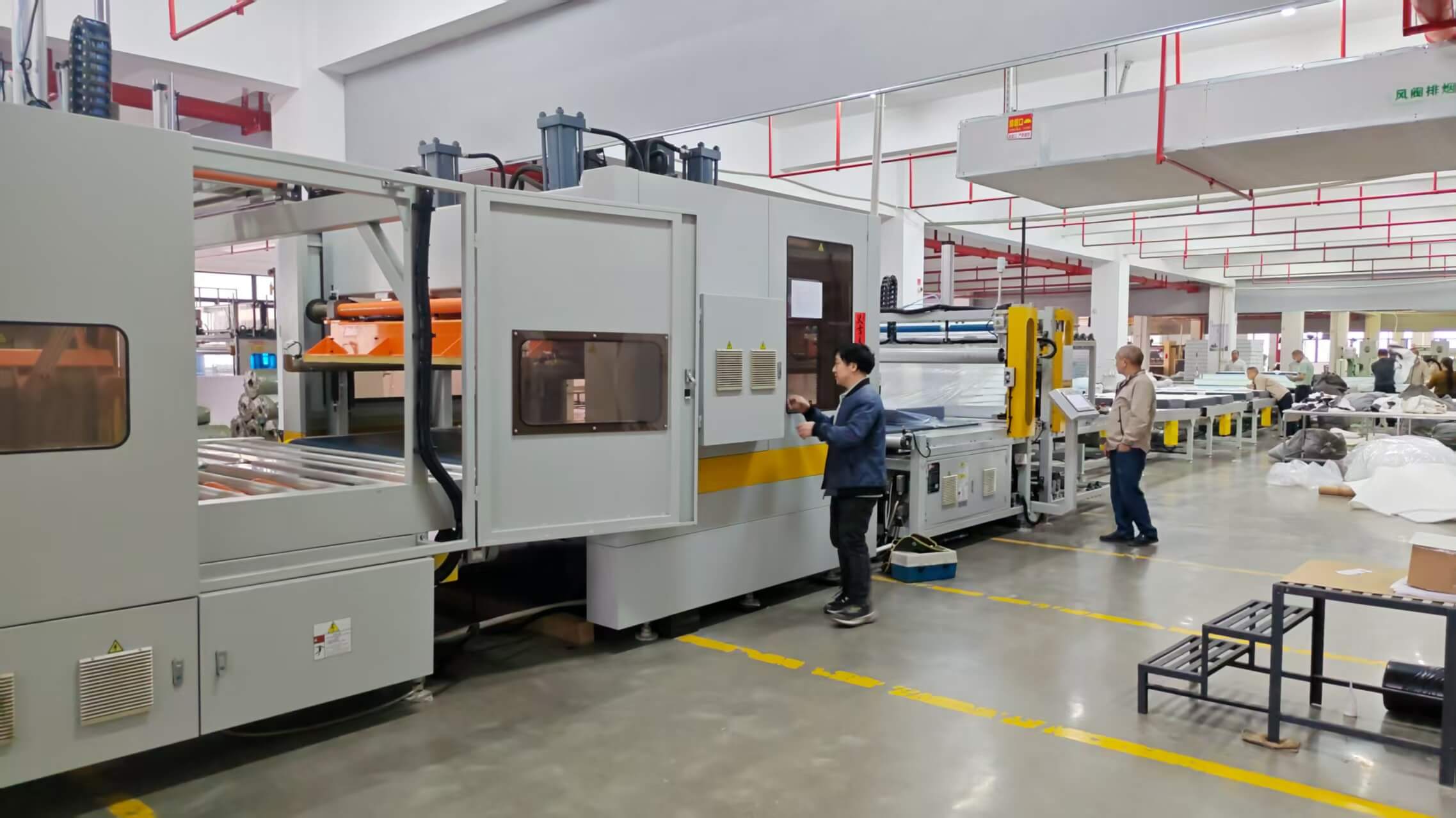 The spacious and organized raw material processing area at MX Dream's factory, featuring stacks of high-density foam ready for the production of compressed sofas and mattresses The spacious and organized raw material processing area at MX Dream's factory, featuring stacks of high-density foam ready for the production of compressed sofas and mattresses